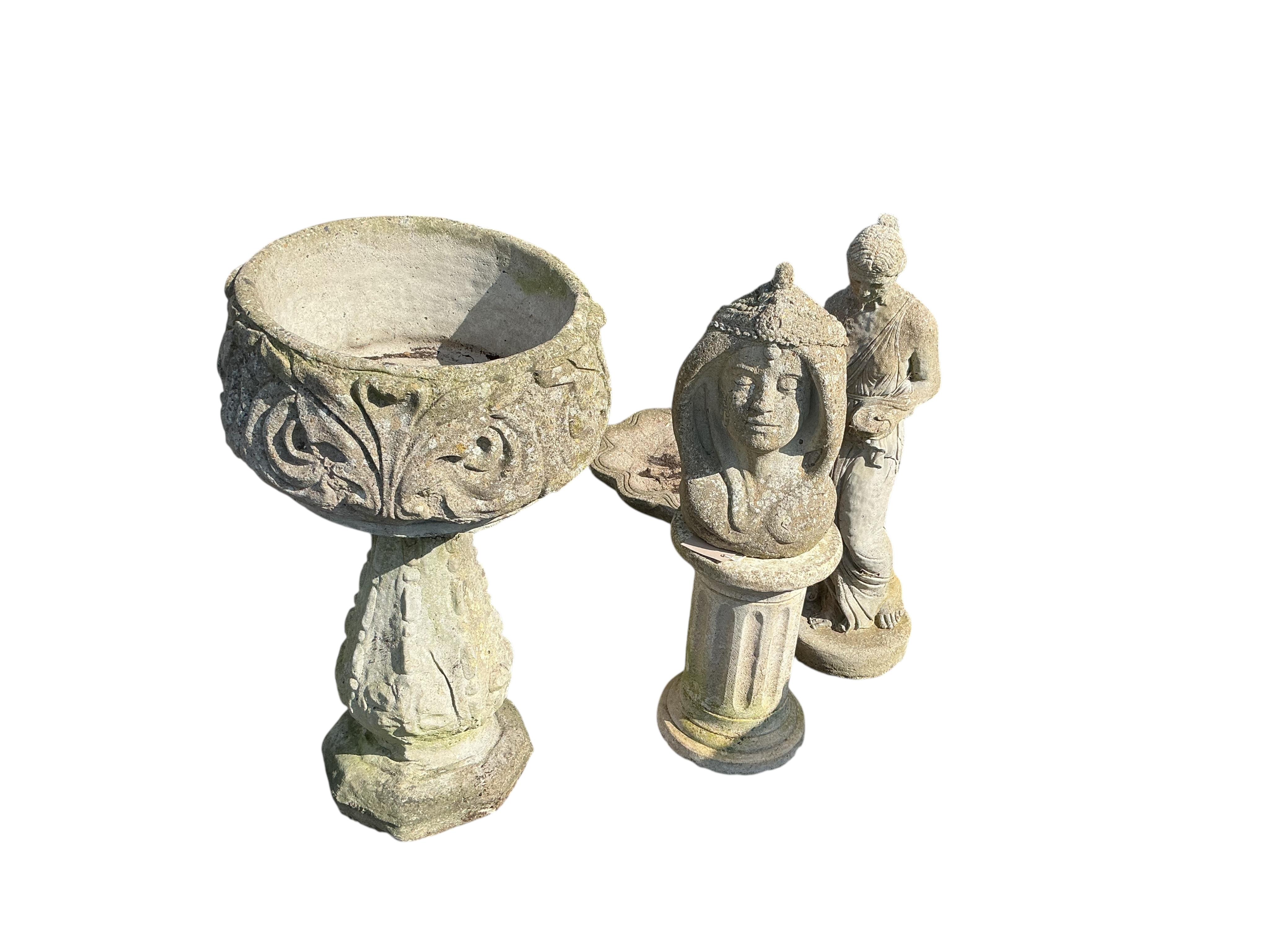 A reconstituted stone urn on pedestal, a stone bust on pedestal, a shell bird bath and a female statue, largest height 72cm